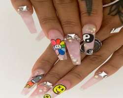 She loves nail art and has made beautiful designs on her nails.
